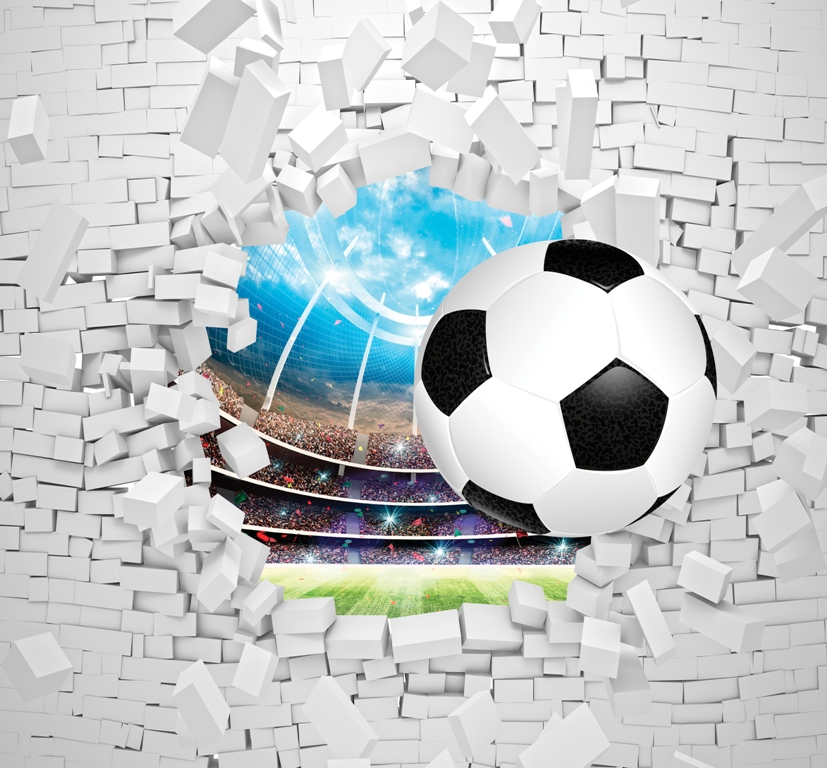 Футбольный мяч на фоне кирпичной стены